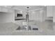 Close-up of a kitchen with granite countertops and stainless steel appliances at 3604 N Campbell Rd, Las Vegas, NV 89129