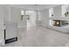 Bright and airy living room with modern light wood floors, a fireplace, and large windows at 3604 N Campbell Rd, Las Vegas, NV 89129