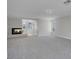 Open living room with neutral carpeting, a fireplace, and windows for natural light showcases comfort and design at 3604 N Campbell Rd, Las Vegas, NV 89129