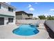 This backyard boasts a pool and integrated hot tub for relaxing and entertaining at 3604 N Campbell Rd, Las Vegas, NV 89129