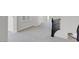 Spacious upstairs hallway with neutral-toned carpeting, a dark-stained railing, and a clear view of the staircase at 3604 N Campbell Rd, Las Vegas, NV 89129