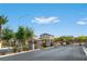 Gated community entrance with lush landscaping and a secure entry point at 3729 Canis Minor Ln # 10206, Henderson, NV 89052