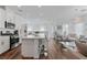 Bright, open kitchen with stainless steel appliances and a large island with bar seating at 3729 Canis Minor Ln # 10206, Henderson, NV 89052