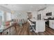 Open-concept living space with a kitchen island, living room, and modern decor at 3729 Canis Minor Ln # 10206, Henderson, NV 89052
