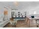 Open floor plan with a modern kitchen island, living room, and stylish furnishings at 3729 Canis Minor Ln # 10206, Henderson, NV 89052