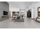 Spacious living room with an island, fireplace, and open floor plan at 38 Skybird Ct, Las Vegas, NV 89135
