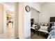 Comfortable bedroom featuring a mirrored closet and warm neutral tones at 4015 Galiceno Dr, Las Vegas, NV 89122
