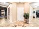 Inviting foyer with decorative tile flooring, neutral paint, and a view into other rooms at 4015 Galiceno Dr, Las Vegas, NV 89122