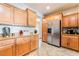 Spacious kitchen with stainless steel refrigerator and ample cabinet space at 4015 Galiceno Dr, Las Vegas, NV 89122