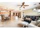 Open-concept living room with a seamless transition to the kitchen and dining area at 4015 Galiceno Dr, Las Vegas, NV 89122