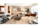 Bright living room with a neutral color scheme, plush seating, and stylish decor at 4015 Galiceno Dr, Las Vegas, NV 89122