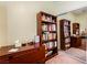 Office featuring a book shelf with books, drawers, and mirrored closet at 4015 Galiceno Dr, Las Vegas, NV 89122