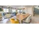 Open concept living room with kitchen view, perfect for entertaining guests at 4439 Bayley Skye Ave # 105, Las Vegas, NV 89141