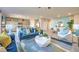 Spacious open-concept living area with view of the kitchen and dining room at 4439 Bayley Skye Ave # 105, Las Vegas, NV 89141
