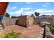 Backyard features a gravel area, a shed, and mature landscaping at 4565 Halbert Ave, Las Vegas, NV 89110