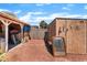 View of backyard with utility shed and miscellaneous equipment at 4565 Halbert Ave, Las Vegas, NV 89110