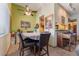 The cozy dining area features a ceiling fan and decor at 4565 Halbert Ave, Las Vegas, NV 89110