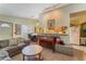 Bright living space features open layout to kitchen, tiled floors and natural light at 4565 Halbert Ave, Las Vegas, NV 89110