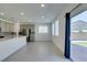 Bright kitchen with sliding door access to the backyard and stainless steel appliances at 4633 Fragrant St, North Las Vegas, NV 89031