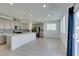 Modern kitchen with stainless steel appliances, granite countertops, and ample natural light at 4633 Fragrant St, North Las Vegas, NV 89031