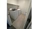 A well-organized laundry room complete with modern, front-load washing machine and dryer at 4633 Fragrant St, North Las Vegas, NV 89031