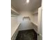 Spacious walk-in closet featuring ample shelving and natural light at 4633 Fragrant St, North Las Vegas, NV 89031