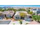 Aerial view of house showcasing desert landscape with mountains in the background at 5017 Kaibab Forest Ave, Las Vegas, NV 89141