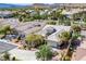 Aerial view of the home showcasing roof shape, manicured landscaping and surrounding neighborhood at 5017 Kaibab Forest Ave, Las Vegas, NV 89141