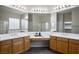 Spacious bathroom featuring double sinks, a vanity area, and ample storage at 5017 Kaibab Forest Ave, Las Vegas, NV 89141