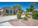 Exterior of house showcasing large driveway and desert landscaping at 5017 Kaibab Forest Ave, Las Vegas, NV 89141
