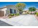 Exterior of house showcasing large driveway and desert landscaping at 5017 Kaibab Forest Ave, Las Vegas, NV 89141