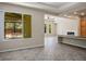 Open concept living area featuring tile floors, recessed lighting and access to the outdoor patio at 5017 Kaibab Forest Ave, Las Vegas, NV 89141