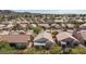 Serene residential neighborhood aerial view, showcasing tree-lined streets and diverse single-Gathering homes at 502 Edgefield Ridge Pl, Henderson, NV 89012