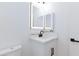 Bathroom with vanity, mirror with integrated lighting, and a toilet at 502 Edgefield Ridge Pl, Henderson, NV 89012