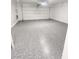 Epoxy floor inside an oversized 2-car garage with an automatic door at 502 Edgefield Ridge Pl, Henderson, NV 89012