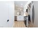 Modern kitchen with stainless steel appliances offers a sleek design and ample storage space at 502 Edgefield Ridge Pl, Henderson, NV 89012