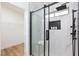 Luxurious walk-in shower featuring frameless glass doors and a built-in soap niche at 502 Edgefield Ridge Pl, Henderson, NV 89012