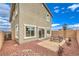 A spacious backyard with desert landscaping and a patio seating area offers a relaxing outdoor retreat at 505 Red Lovebird Ave # Lot 1229, Henderson, NV 89011