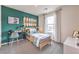 Charming bedroom with stylish décor, a modern desk, and plenty of natural light at 505 Red Lovebird Ave # Lot 1229, Henderson, NV 89011