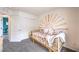 Bright bedroom featuring a charming daybed with a colorful sun mural on the wall at 505 Red Lovebird Ave # Lot 1229, Henderson, NV 89011