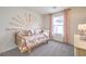 Cheerful bedroom with a sunburst wall design, colorful accents, and a cozy daybed at 505 Red Lovebird Ave # Lot 1229, Henderson, NV 89011