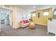 Comfortable living room with a soft beige sofa, decorative cushions, and natural light at 505 Red Lovebird Ave # Lot 1229, Henderson, NV 89011