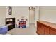 Cozy room with character decor, a dresser and carpeting at 5321 Welch Valley Ave, Las Vegas, NV 89131