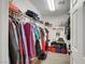Organized walk-in closet with clothing racks, shelves, and storage cubes at 5321 Welch Valley Ave, Las Vegas, NV 89131