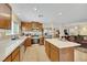 Bright kitchen with a center island, stainless steel appliances, and an open layout at 5321 Welch Valley Ave, Las Vegas, NV 89131