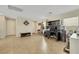 Open-concept living space with tile floors, offering versatility and functionality for modern living at 5321 Welch Valley Ave, Las Vegas, NV 89131