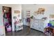 Organized bedroom with dresser, closet, and toys, offering both storage and a playful atmosphere at 5733 Coral Sun St, North Las Vegas, NV 89031