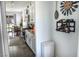 Bright kitchen with white cabinets, modern appliances, and an adjacent dining area at 5733 Coral Sun St, North Las Vegas, NV 89031
