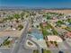 Single Gathering house has desert landscaping with a spacious front yard and mountain views at 6490 Wagon Wheel Ct, Pahrump, NV 89061