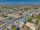 Single Gathering house has desert landscaping with a spacious front yard and mountain views at 6490 Wagon Wheel Ct, Pahrump, NV 89061